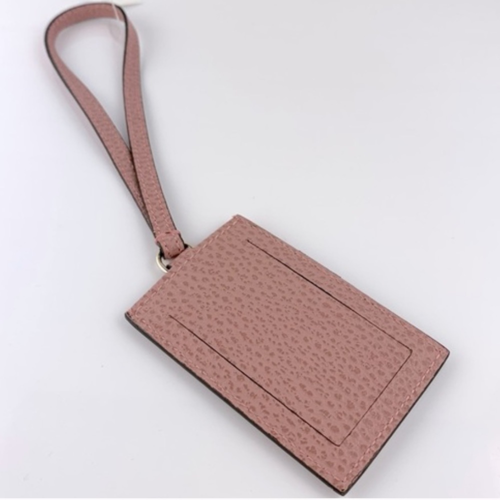 Gucci luggage tag! Brand new! No box. Never used. Warm pink color! Not lavender